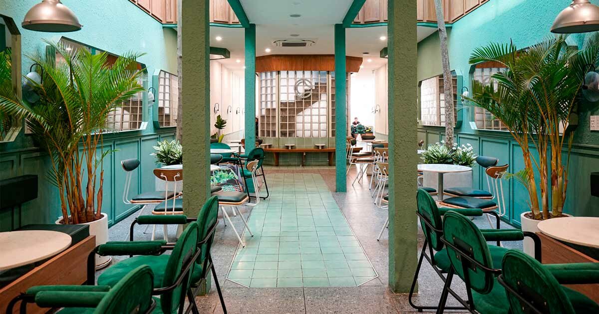 coco cha café develops around atrium of glass blocks in vietnam