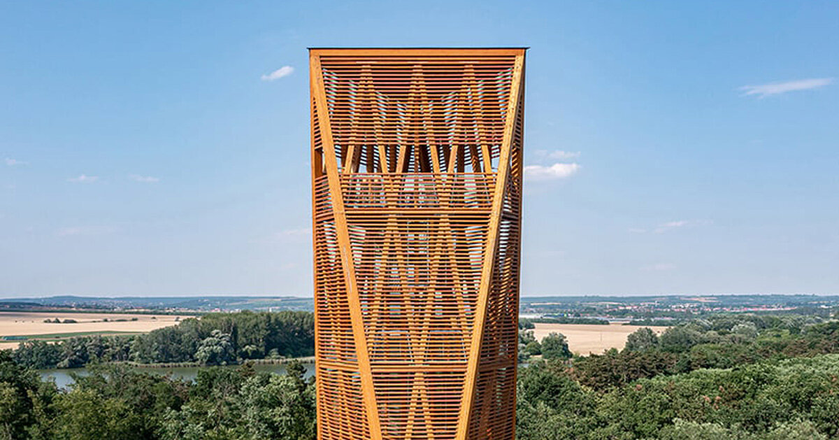 winding timber lookout tower rises above budapest's nature reserve for 360-degree vistas