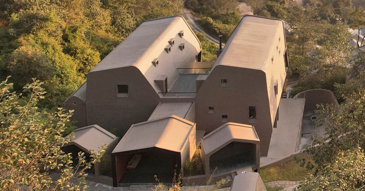 MAP’s Cloudcatcher emerges from a hill resort in Nepal as two rock-like volumes