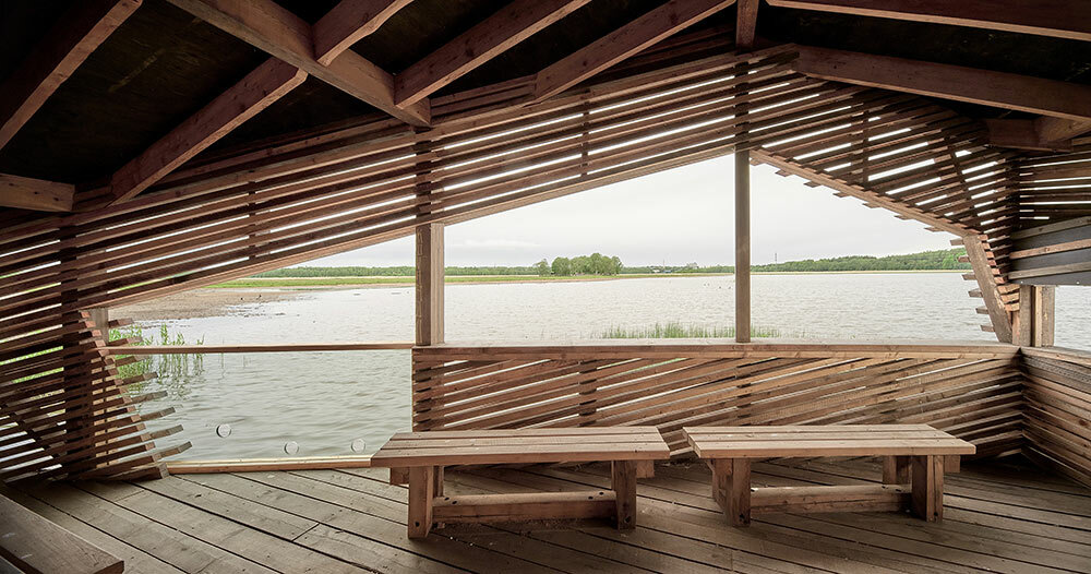 in puisto designs timber birdwatchers finland hut floating studio for