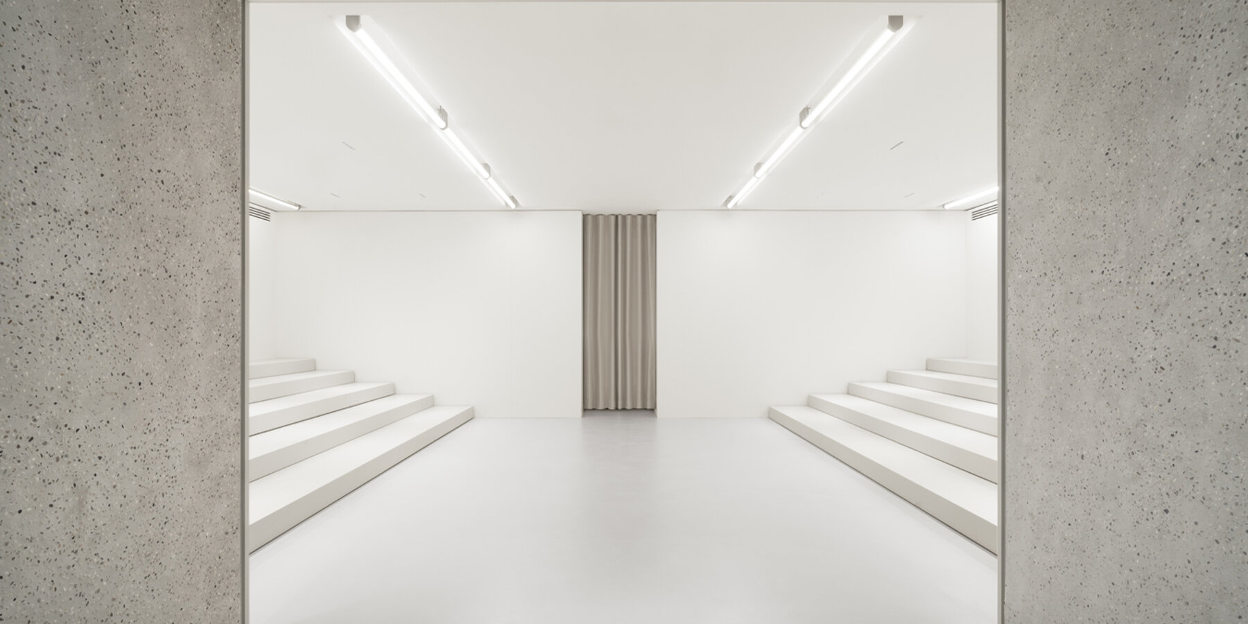a meditative forum at the marsèll flagship in milan welcomes art shows and gatherings