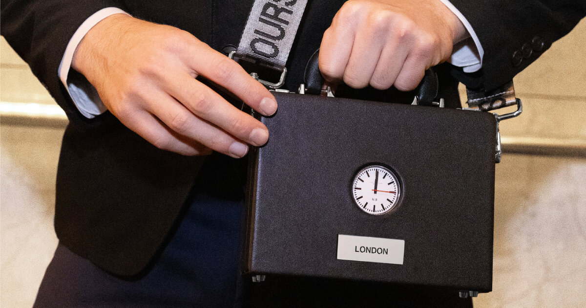 nik bentel puts anicorn's watch on a mini sling briefcase so