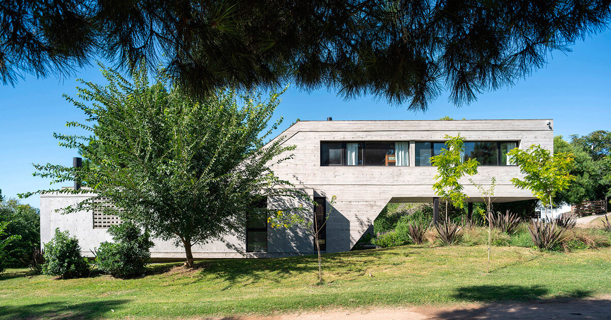 casa tres' exposed concrete volume by estudio galera floats above steep slope in argentina - Vimarsana News