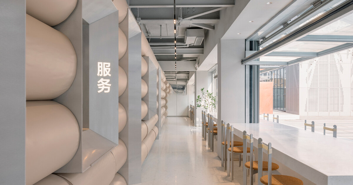 padded cylinders flood noodle restaurant’s interiors by office aio
