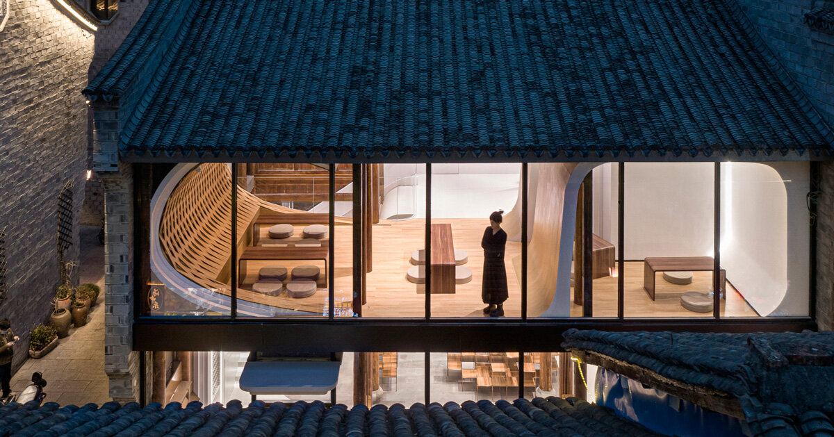 LYCS architecture's jiang nan zan store rises as a wave above linhai