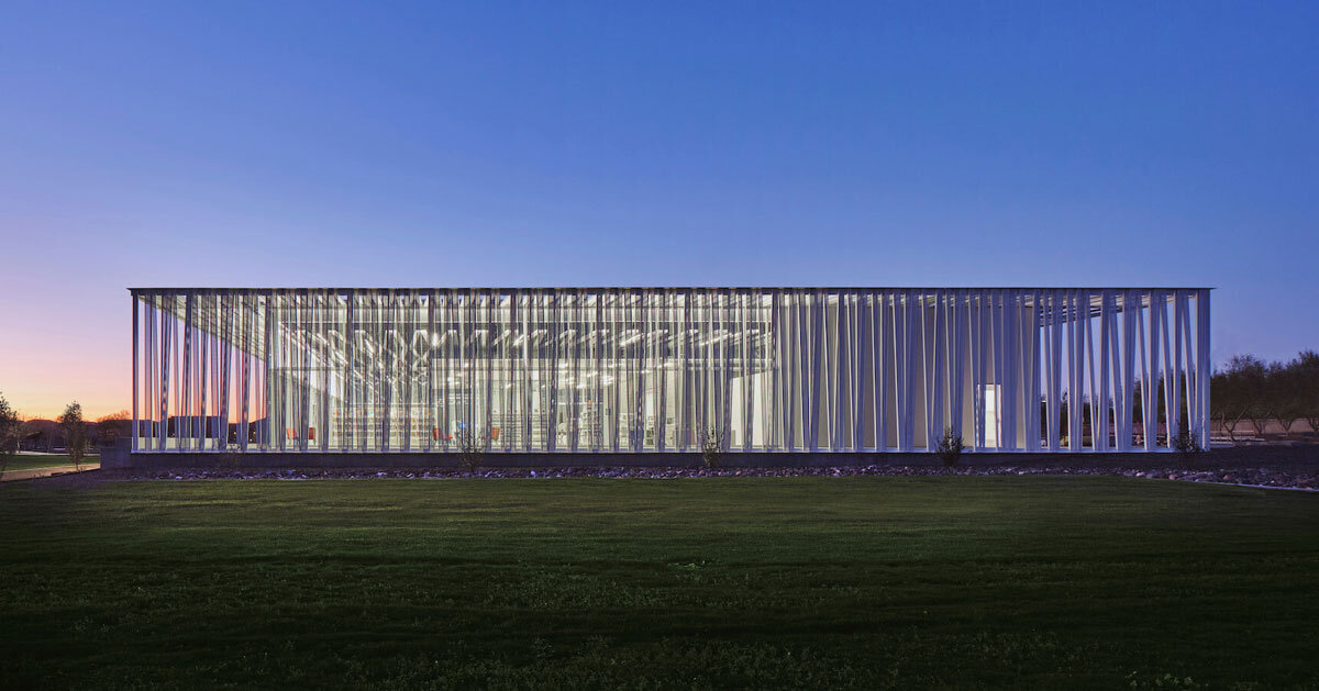 Canopy Library perforated metallic canopy filters light within asante public library
