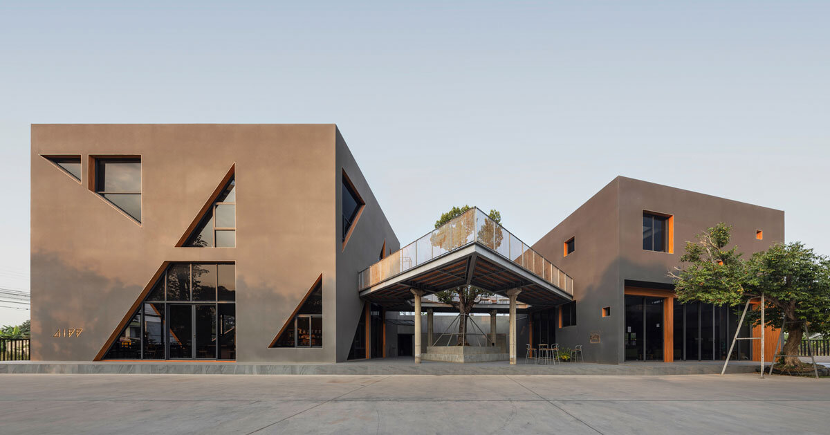 triangular skylights pierce cafe's concrete volumes by ASWA in thailand