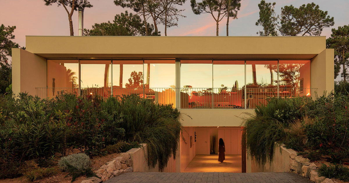 four planes coated in white stucco compose casa calma by araja studio in portugal