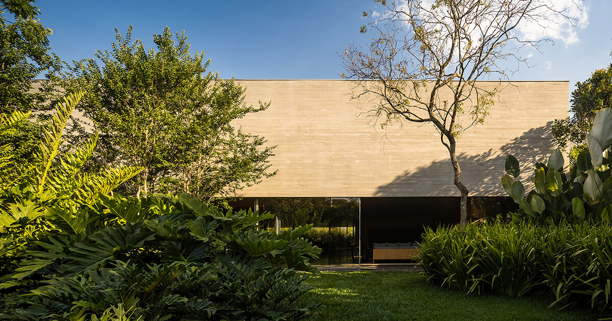 studio MK27's monolithic concrete house unfolds onto tropical garden in sao paulo
