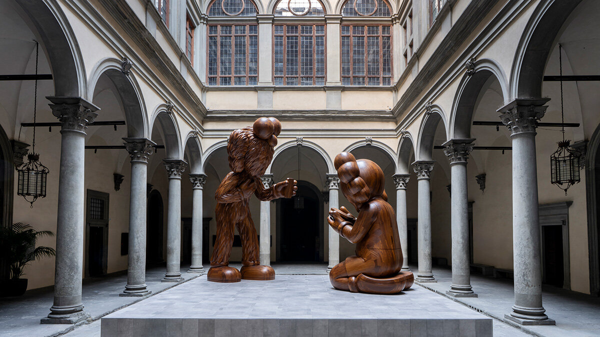 KAWS lands in renaissance florence with large-scale timber installation 'the message'