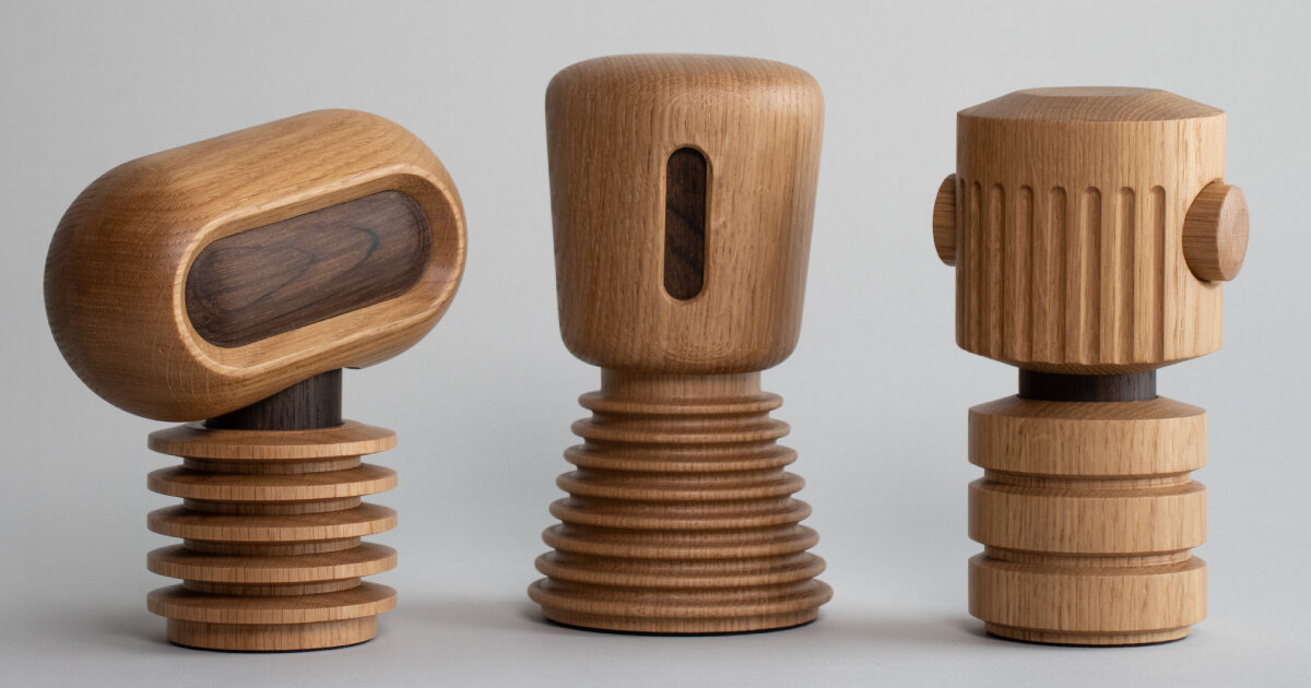 mini wooden robots nod and tilt their heads when users receive notifications on their phones
