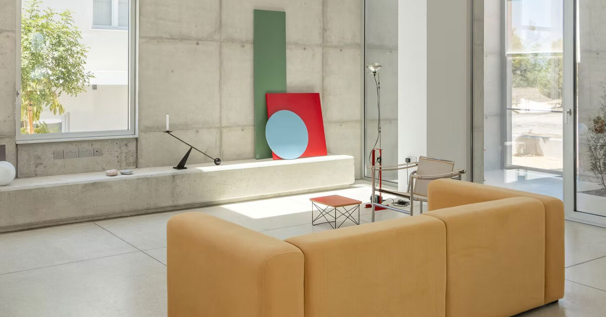 vertical cuts split monolithic 'cube within a cube' suburban residence in cyprus