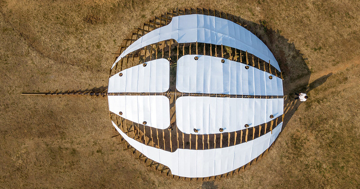 arching timber shell installation by cheng tsung feng evokes the horseshoe crab in taiwan