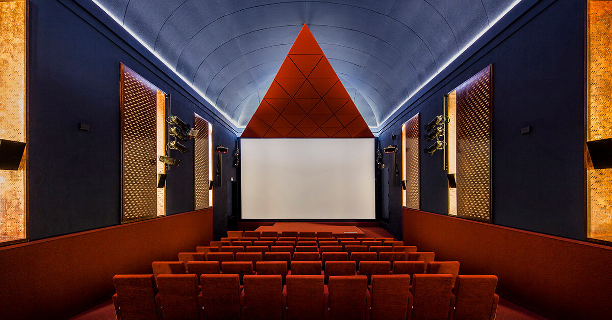 BACH converts reina sofia's auditorium into red-velvet cinema beneath blue vault in madrid