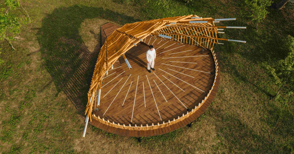 interwoven bamboo poles fan outward to form theater stage by cheng tsung feng