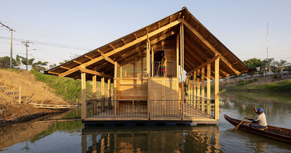 natura futura restores floating neighborhood of seven 'raft' houses in ecuador