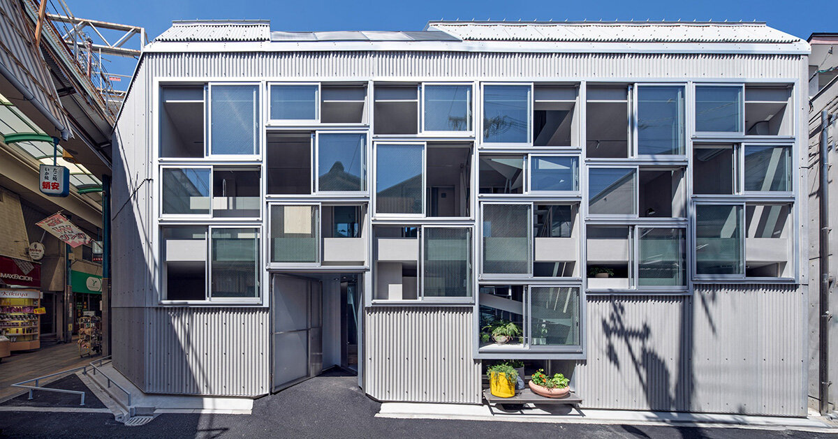 grid of operable windows fronts slender residence by okuwada architects in osaka