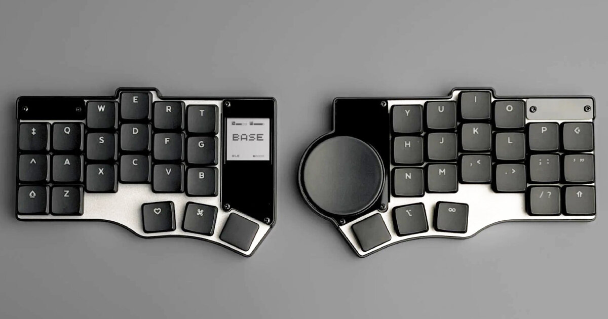 portable split keyboard with flat circular 'mouse' fits tray tables on airplanes and trains
