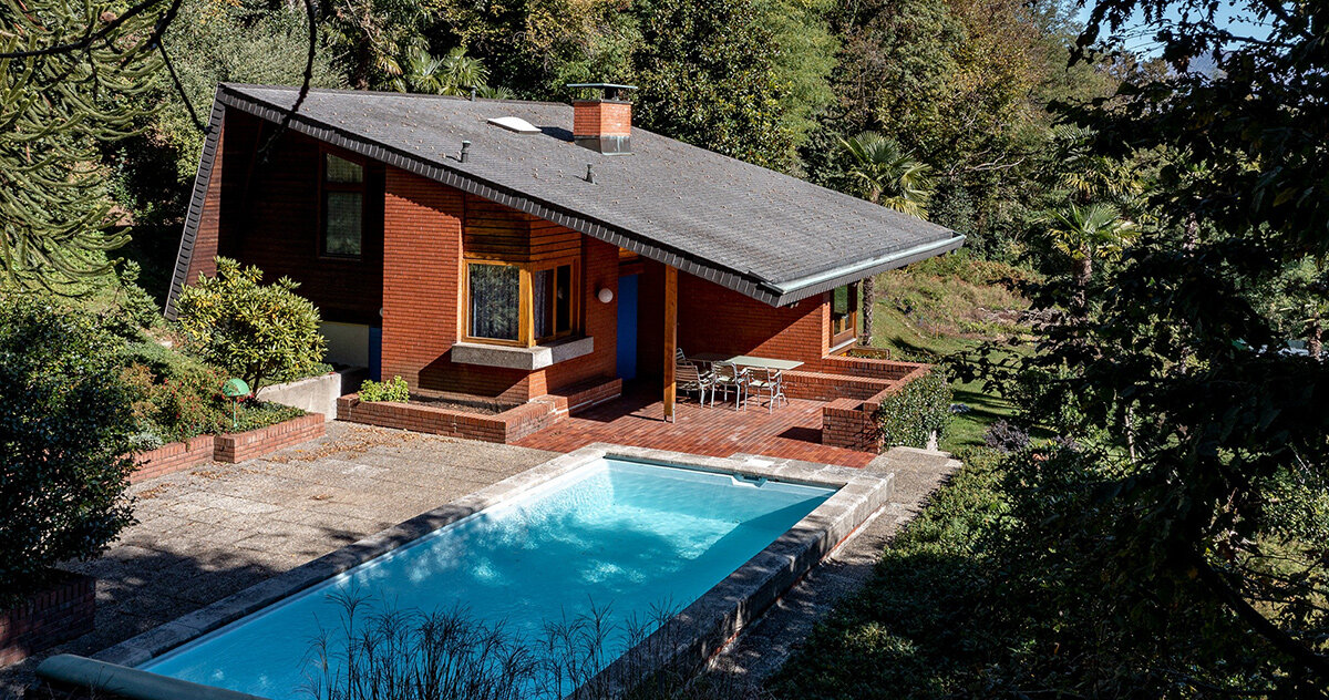 casa vernate: architect enrico sassi revisits a 1970s lake house in switzerland