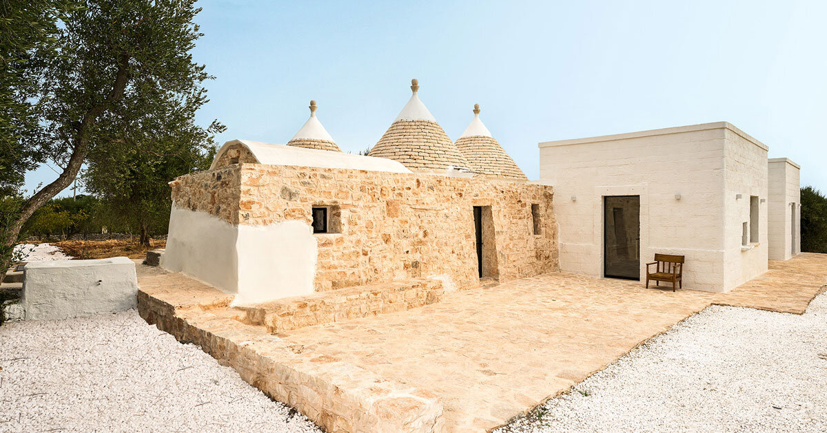 three traditional stone-domed trulli fuse with contemporary residence by studio8 in italy