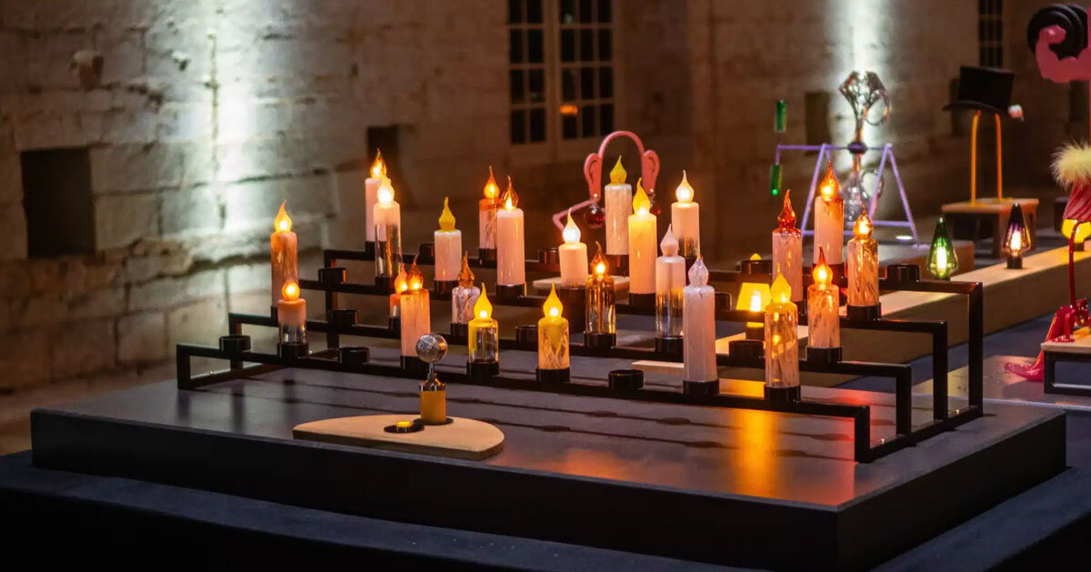 sensory machines of glass, light and sound animate 20-meter interactive christmas table