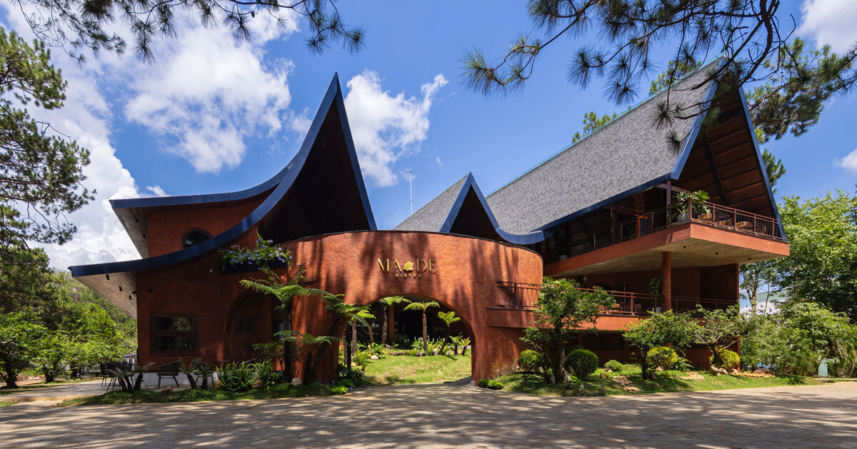 interlinked peaks shape bistro’s rhythmic canopy echoing mountain ridge in vietnam