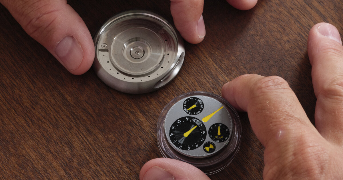 marc newson crafts ressence's watch with hands suspended in removable oil-filled chamber