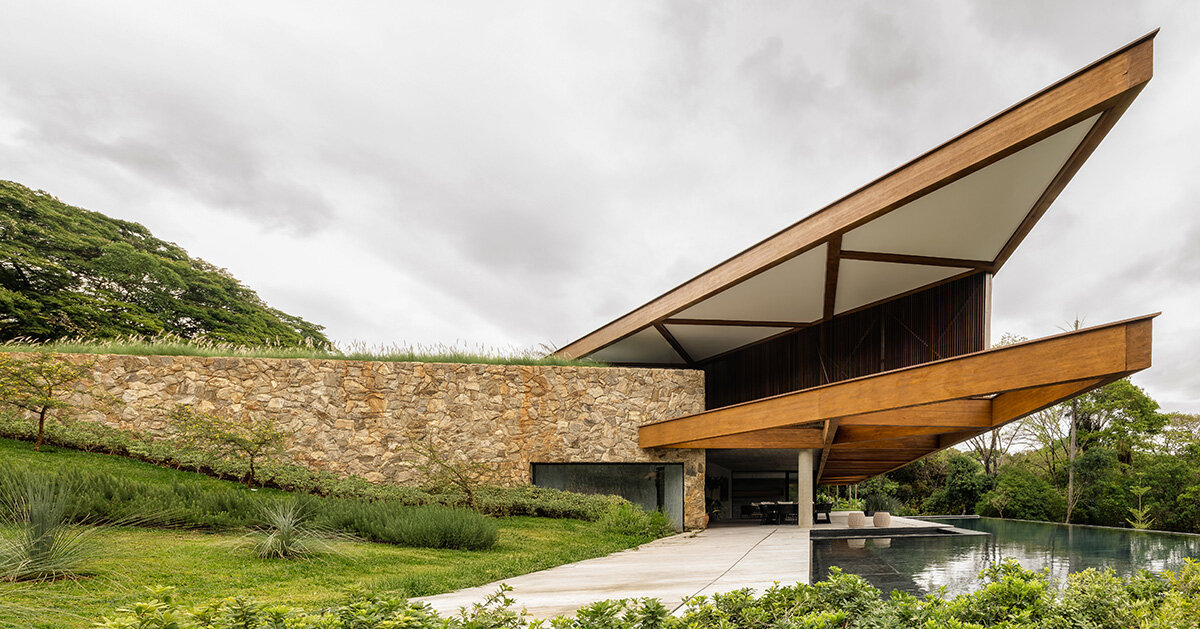 TETRO’s lakeside residence in brazil vanishes into the horizon beneath triangular timber roof