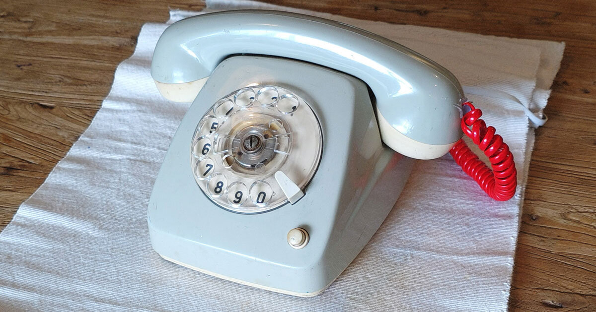 vintage rotary telephone transforms into analog-digital hybrid music player and AI voice chat