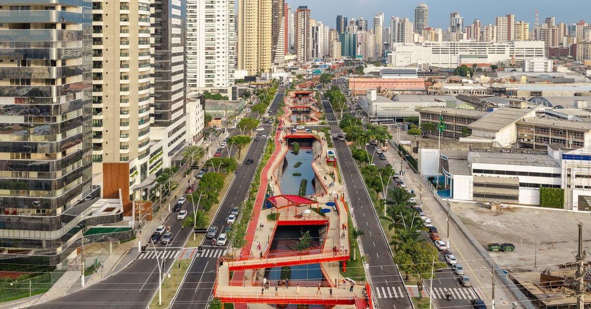 elevated linear park reclaims canal runing along brazilian city center