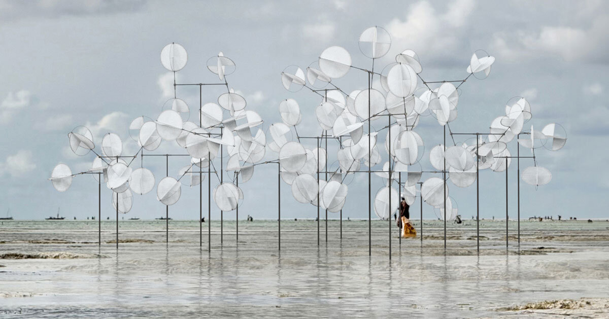 rotating canvas discs dance with the wind for vincent leroy's kinetic installation in zanzibar