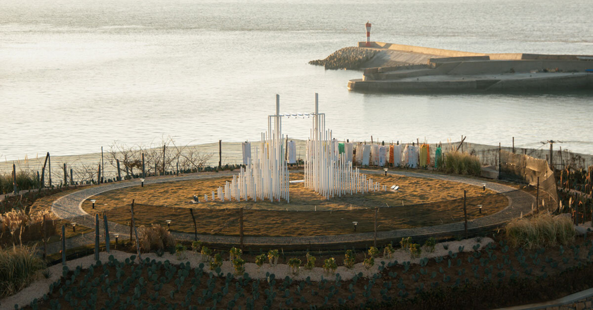 forest of steel pillars creates swinging installation enveloped in cloud-like mist in china