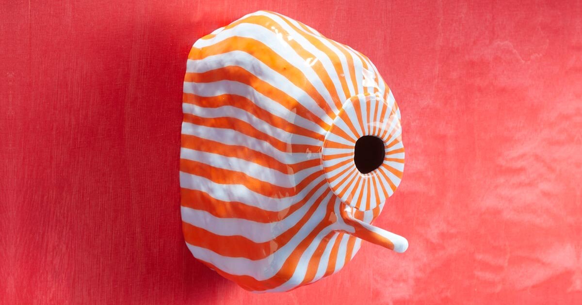 over 75 birdhouse designs explore the concept of home at MAD brussels exhibition