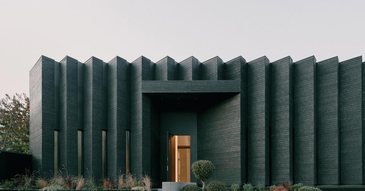 serrated charred wood shell encloses suburban residence on the hills of tbilisi