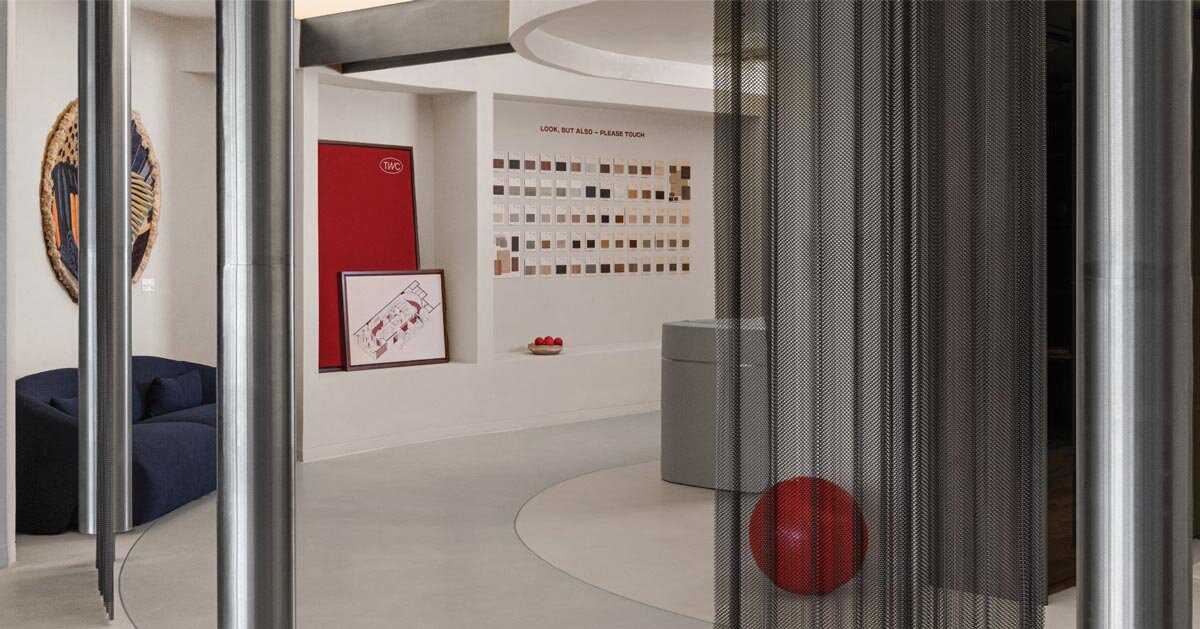 concrete and steel textures shape showroom in india organized as a continuous loop