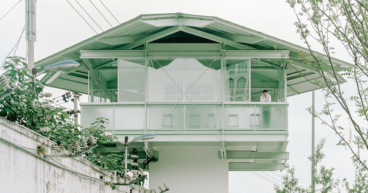 tiny 24-hour bookstore by SZ-architects crowns former prison watchtower in china