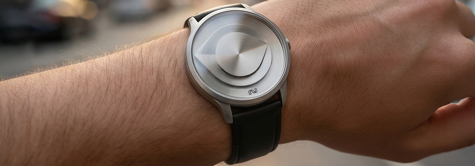 Fold Watch Tells Time Through Shadow and Layered Architectural Dials