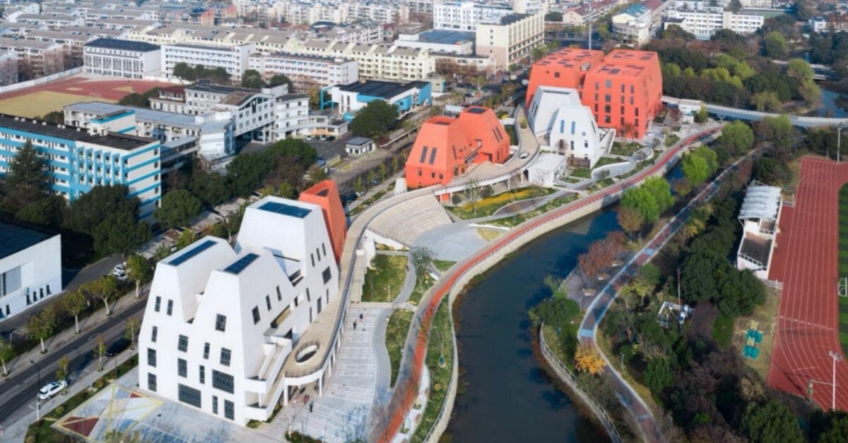 red and white geometric sports complex emerges along daixi's riverfront