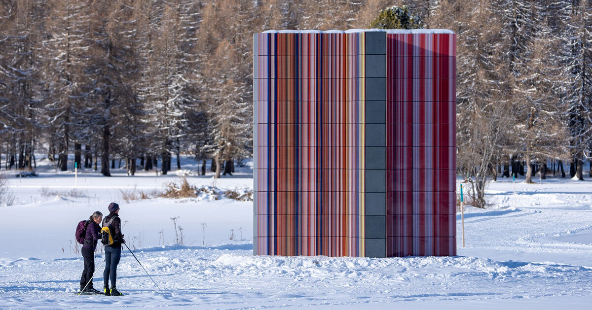 glazed color bands rise as sculptural tower in gerhard richter's alpine installation