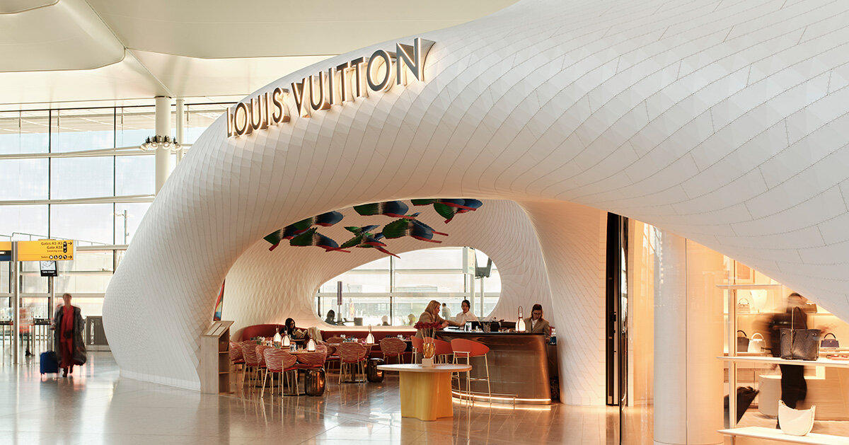 marc fornes / THEVERYMANY lands fuselage-like louis vuitton cafe and store at heathrow