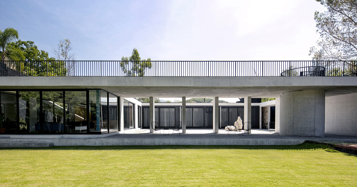 monolithic concrete residence by S-AR opens inward to patios in mexico's villa de santiago