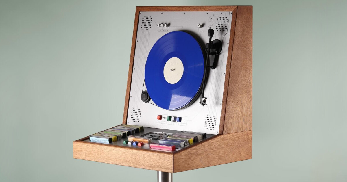 wooden music cabinet by love hulten plays vertical vinyl and casette tapes in one device