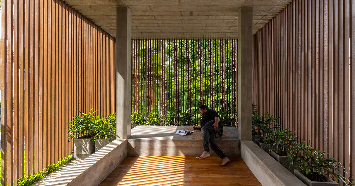 zero studio wraps its garden-filled curtain house with skin of metal screening in india