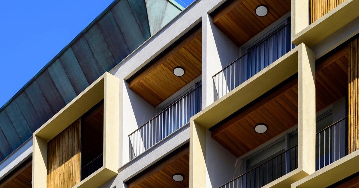 perkins&will pairs bamboo with green-toned corten steel for living block’s facade in brazil