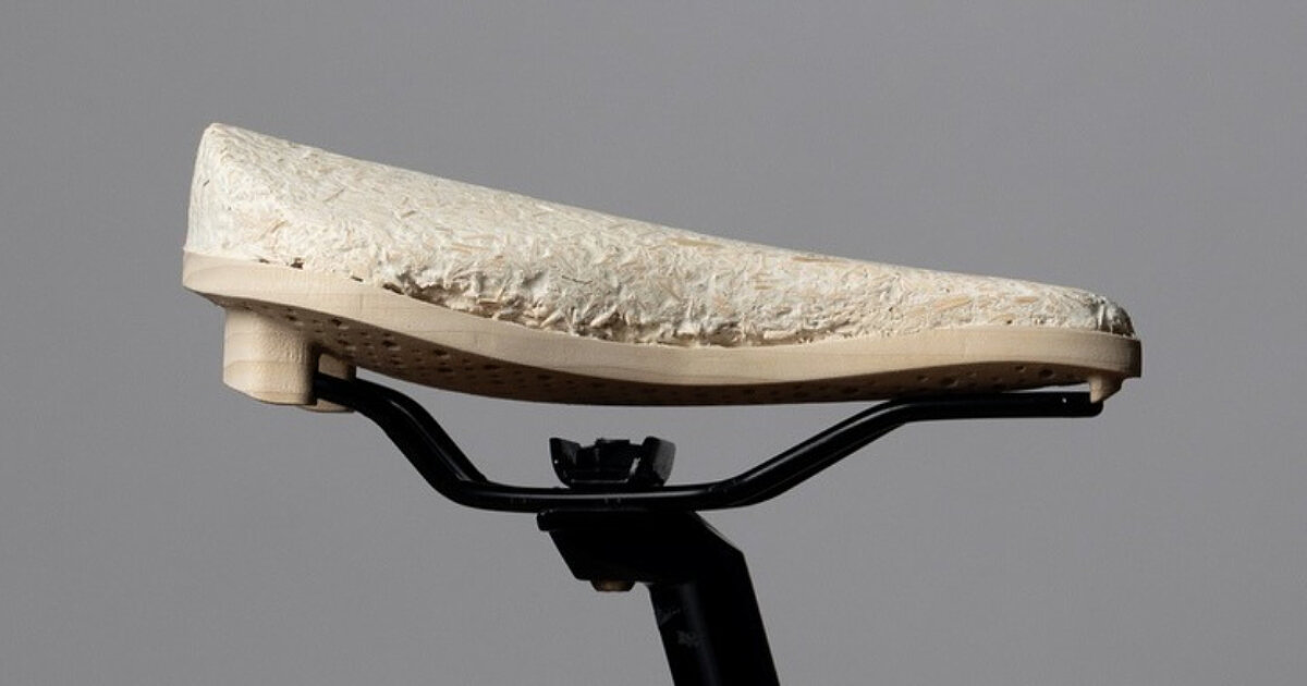 compostable bicycle seat takes shape as mycelium grows around the wooden saddle