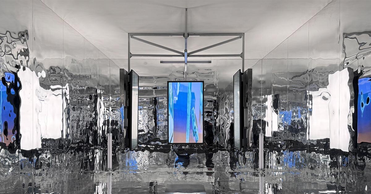 three suspended digital screens translate AI imagery into luminous spatial installation