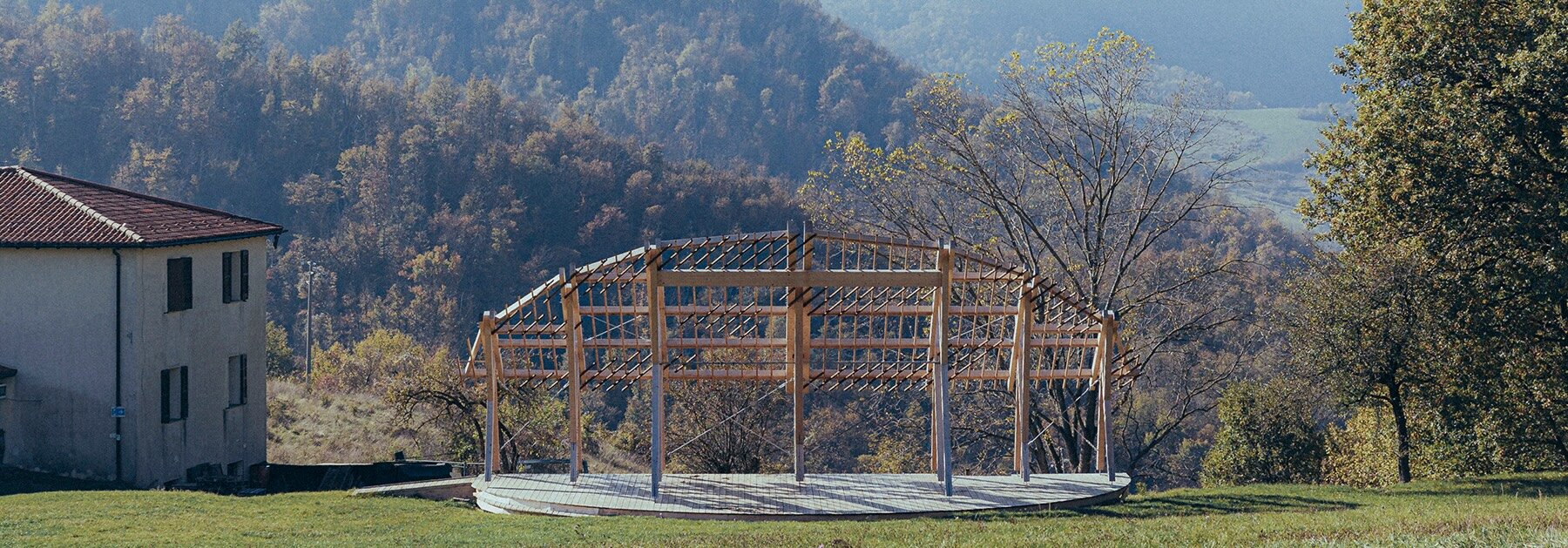 GRRIZ shapes reversible timber structure along the arc of the setting sun in italian mountains