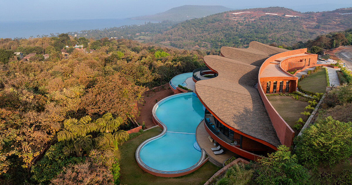 sanjay puri architects shapes ‘crest nine’ with a parabolic rooftop above the arabian sea