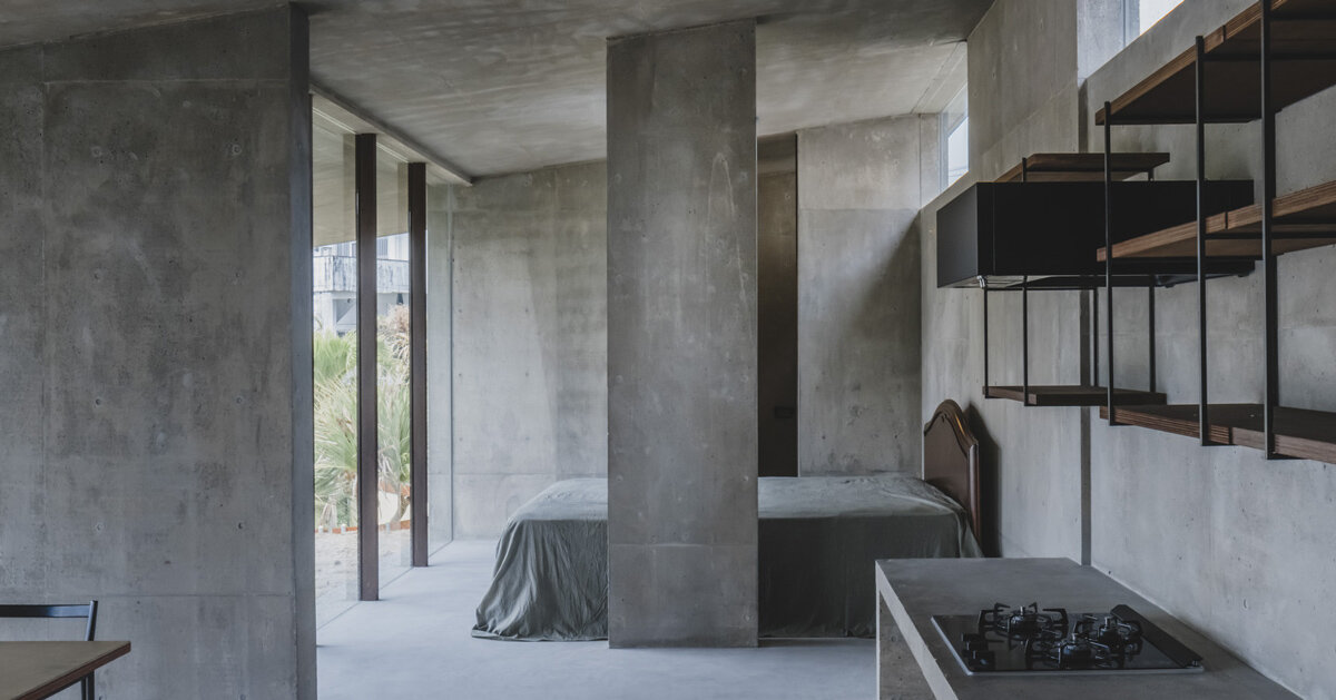 overlapping concrete walls and columns blur inside and outside in okinawa house