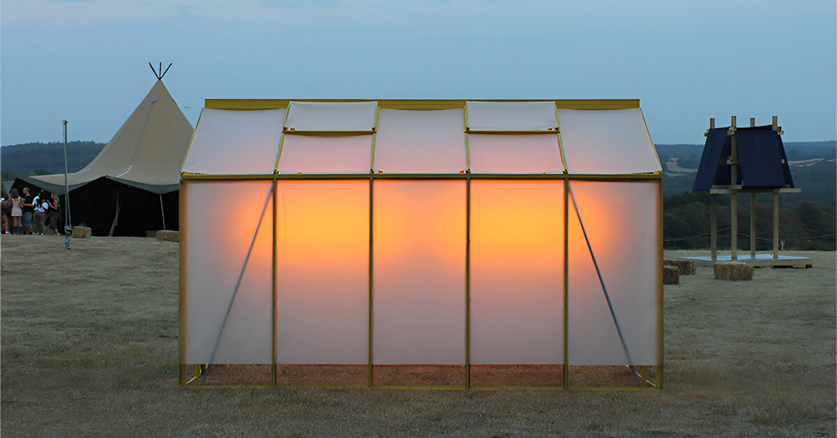 greenhouse converts into inhabitable light installation for music festival